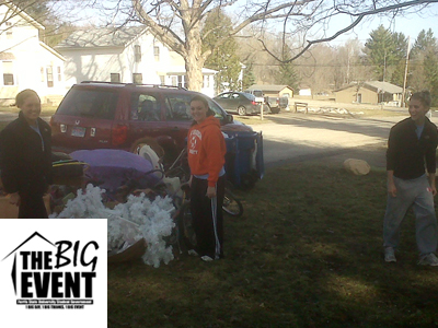 Women's soccer student-athletes Cassie VanderSloot (left), Kelsey Aubil (center), and Kasey Ruimveld (right) assist with a Big Rapids resident's "spring cleaning" during last Saturday's (April 9) The Big Event.