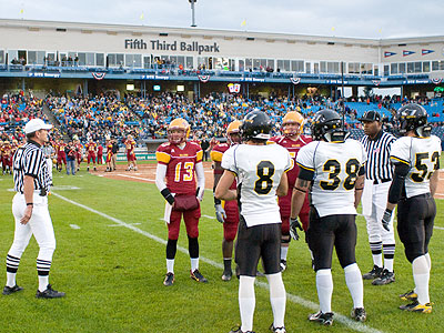 Players gather for the coin flip at Fifth Third Ballpark (Photo by Ed Hyde)