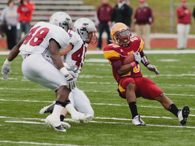 Ferris' David Freeman tries to stay on his feet against Indianapolis (Photo by Ed Hyde)
