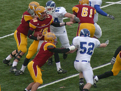 FSU tries to give quarterback Robert Banaszak time to throw against Hillsdale (Photo by Sandy Gholston)