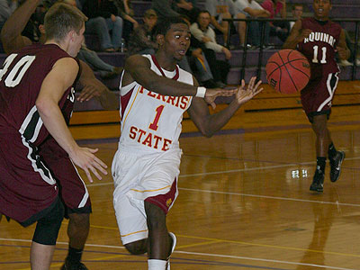Sophomore guard Dontae Molden makes a pass in Thursday's exhibition (Photo by Sandy Gholston)