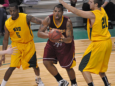FSU senior Justin Keenan looks to pass the ball in Sunday's game at NMU (Photo by Rob Bentley)