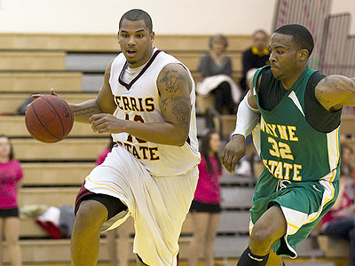 Ferris State's Justin Keenan handles the ball as the Bulldogs take on Wayne State (Photo by Ben Amato)