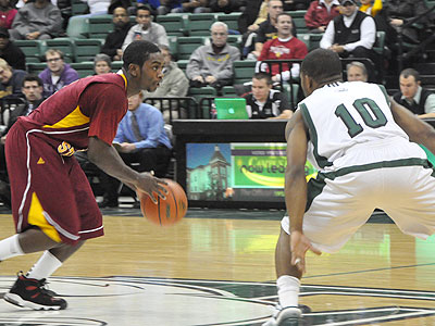 FSU's Dontae Molden works the ball up the floor at Eastern Michigan (Photo by Rob Bentley)