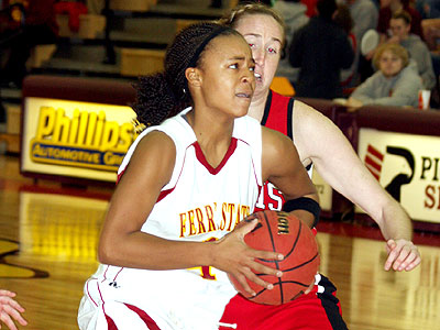 FSU's Tiara Adams drives to the basket in Tuesday's game against Lewis (Photo Courtesy Big Rapids Pioneer)