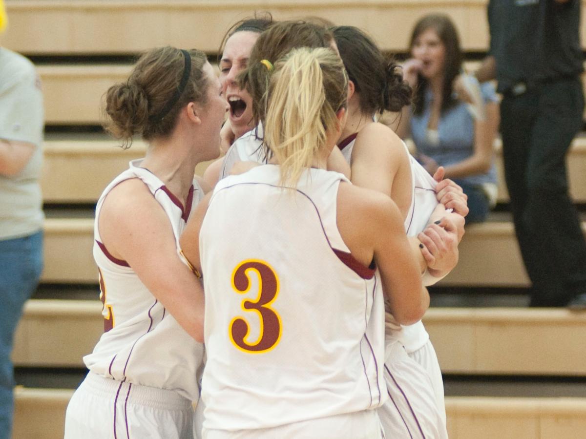 The Bulldog women celebrate after the buzzer-beating win (Photo by Ed Hyde)