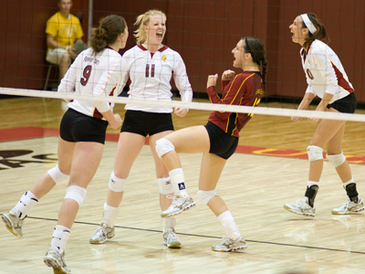 Setter Samantha Fordyce (#11) and her teammates celebrate a point in Ferris State's 3-1 win over West Virginia State at the Ferris State Invitational.