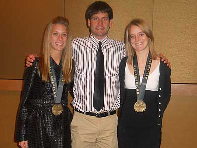 Junior Anna Rudd, head coach Steve Picucci and senior Tina Muir are pictured (left to right)